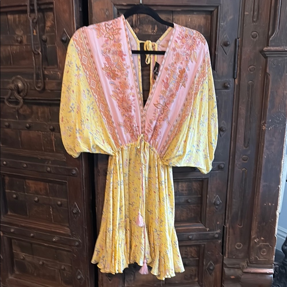 Floral Yellow and Pink Boho Dress Easter hop on it.